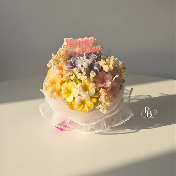 Blooming Celebration: Floral Wax Cake Topper