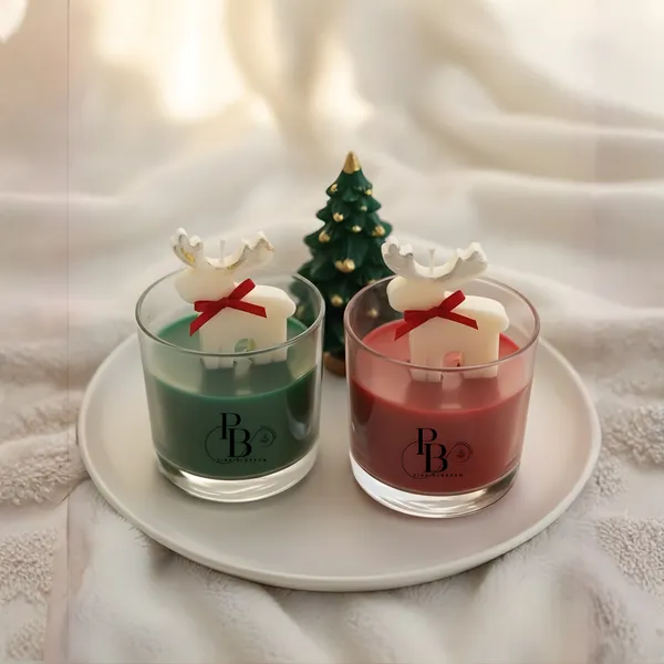 Festive Reindeer Duo: Lit Holiday Candle Set