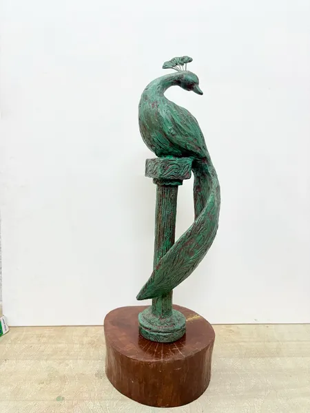 Emerald Peacock Perched in Grace