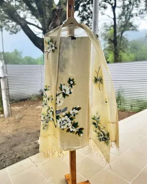 Floral Whispers: Hand-Embroidered Cream Silk Wrap