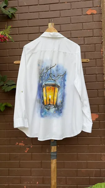 Winter Lantern's Glow: Hand-Painted Shirt