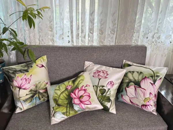Lotus Whispers: Handwoven Floral Cushion Cover Set
