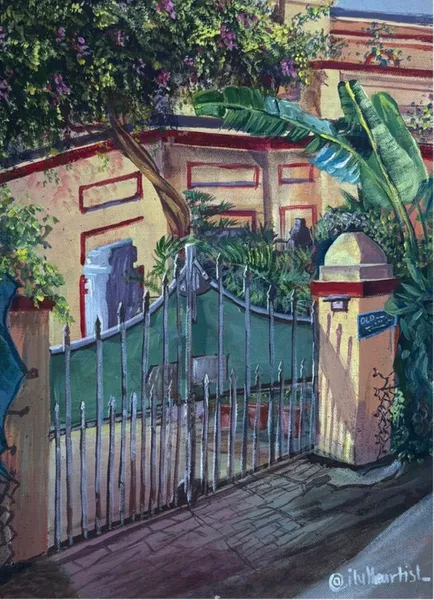 Verdant Gateway: Colonial Courtyard with Blooming Vines
